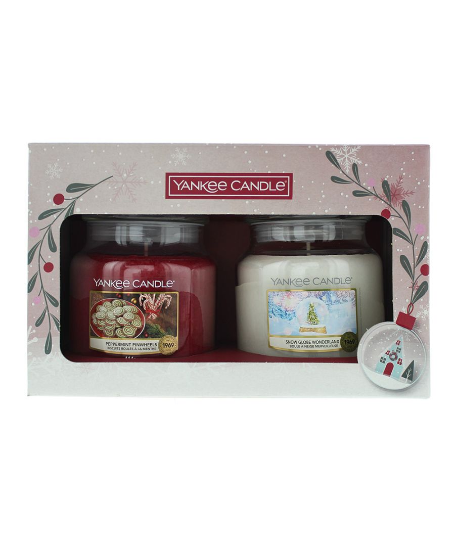 This Yankee Candle gift set has Peppermint Pinwheels Candle which first hits you with notes of Sparkling Peppermint, Melted Butter, Sea Salt  and then warms to a delight of Kettle Corn, Crushed Candy Cane, Winter Mint . Its final impression leaves you with notes of Whipped Vanilla, Dark Chocolate, Frosted Spearmint.  Also Snow Globe Wonderland which first hits you with notes of Icy Mint, Star Anise, Sage, Holly berry and then warms to a delight of Nutmeg, Eucalyptus, Lavender. Its final impression leaves you with notes of Cedarwood, Praline, Snow Moss. Adding a touch of magic to Christmas each making inviting Christmas fragrances that capture the excitement of the holiday.