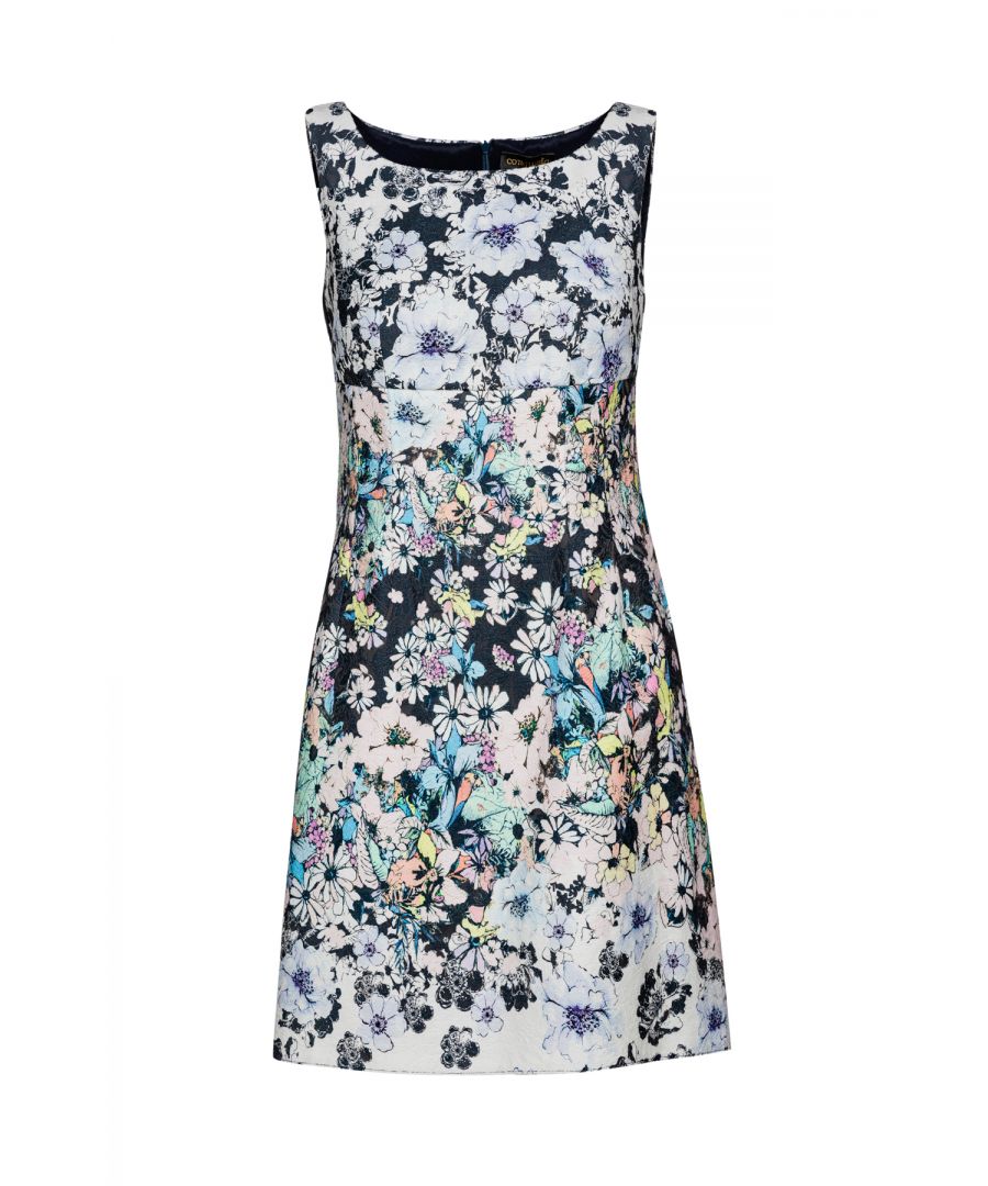 Summer dress in floral stretch brocade. Sleeveless and boat neckline. Darts at the bust. Seam under the bust. Vertical darts under the seam in the front and back. Concealed zip fastening in the back. Fully lined. Empire line.