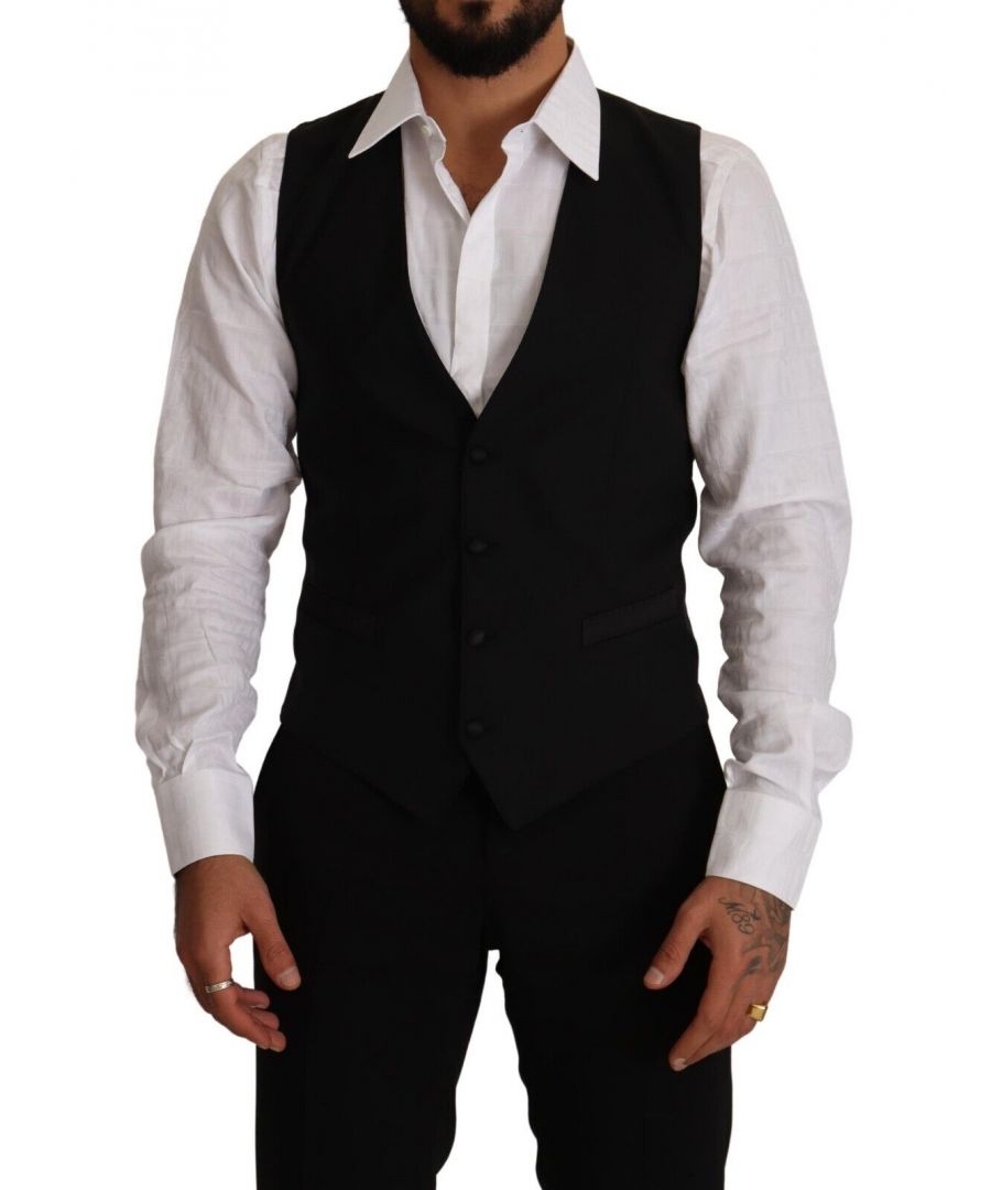 DOLCE & GABBANA\nAbsolutely stunning, 100% Authentic, brand new with tags Black wool dress vest.\nColour: Black\nModel: Formal dress suit vest\nLogo details\nMade in Italy\nMaterial: 87% Virgin Wool 8% Silk 3% Elastane 2% Polyester\nLining: 51% Acetate 49% Viscose