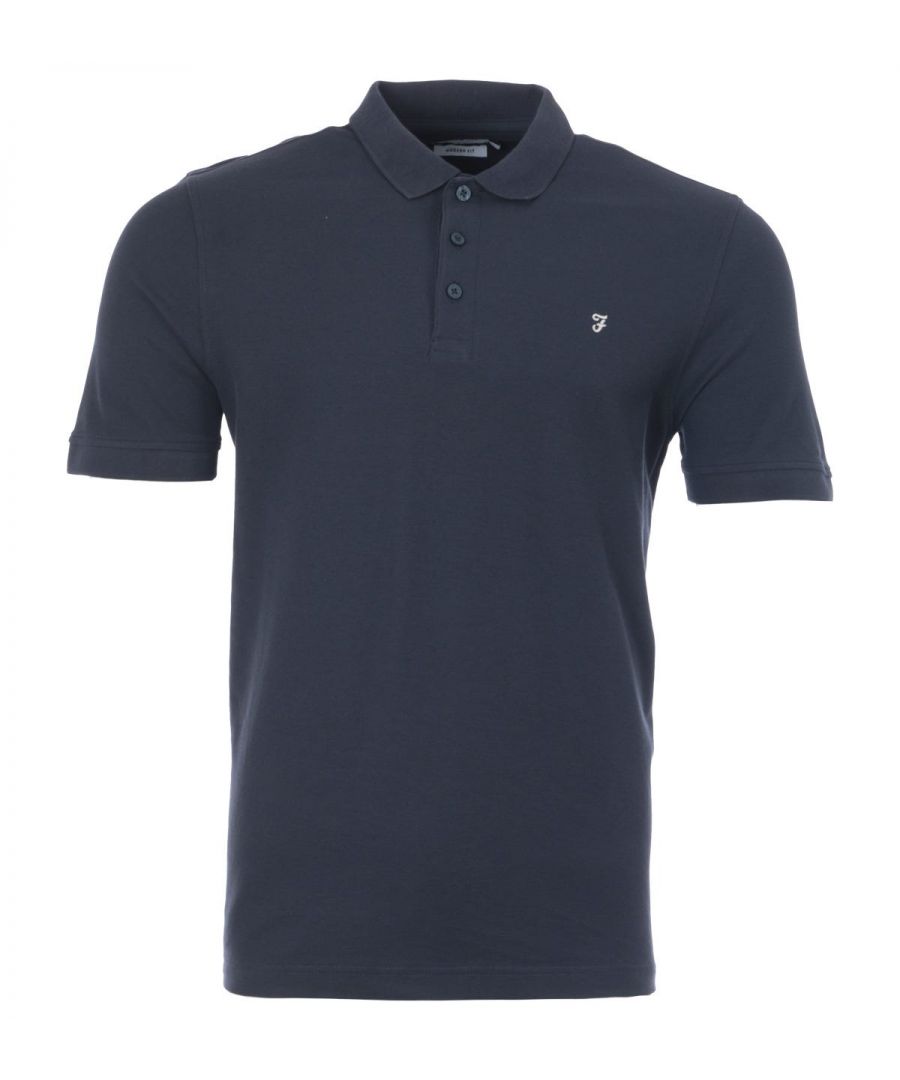 Crafted from pure organic cotton pique, the Cove Polo Shirt from Farah is fitted with a ribbed collar, a classic three button placket and short sleeves with ribbed cuffs. The design is finished with the iconic Farah logo embroidered at the chest. The perfect polo to upgrade your wardrobe basics. Modern Fit, Organic Cotton Pique, Ribbed Collar & Cuffs, Three Button Placket, Short Sleeves, Farah Branding. Style & Fit: Modern Fit, Fits True to Size. Composition & Care: 100% Organic Cotton, Machine Wash.