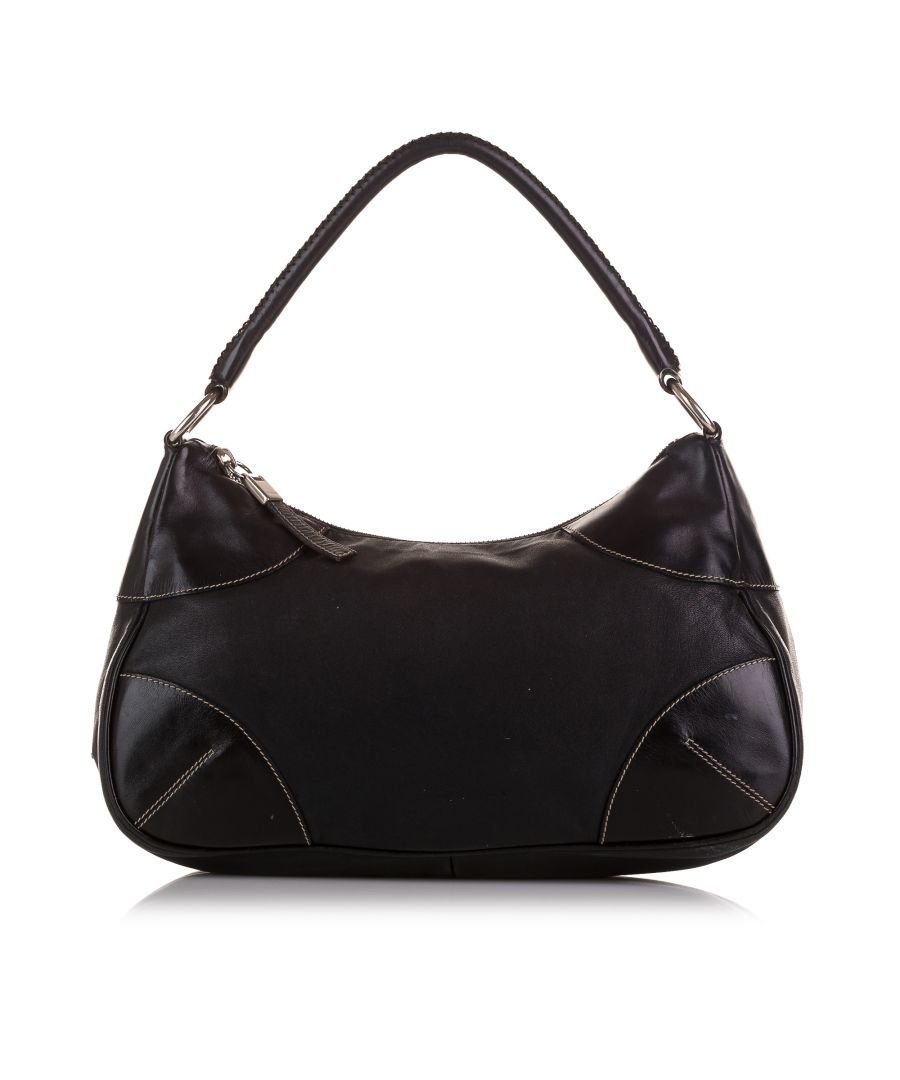 VINTAGE. RRP AS NEW. This shoulder bag features a leather body, a flat strap, a top zip closure, and an interior zip pocket.Exterior Bottom Out Of Shape. Exterior Handle Worn. Exterior Corners Discolored, Worn. Exterior Side Out Of Shape. Practical Attachment Scratched. Zipper Scratched. \n\nDimensions:\nLength 17cm\nWidth 32cm\nDepth 11cm\nHand Drop 18cm\nShoulder Drop 18cm\n\nOriginal Accessories: This item has no other original accessories.\n\nColor: Black\nMaterial: Leather x CalfFabric x Nylon\nCountry of Origin: Italy\nBoutique Reference: SSU202345K1342\n\n\nProduct Rating: GoodCondition\n\nCertificate of Authenticity is available upon request with no extra fee required. Please contact our customer service team.