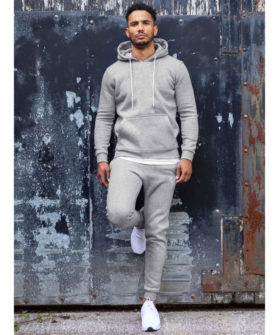 Enzo Mens Pullover Hoodie Tracksuit Set. Enzo Embroidery Logo on Chest. Hoodie with Drawstring. Ribbed Waist and Cuffs. Kangaroo Pockets. Enzo Mens Casual Designer Tracksuit Joggers. Adjustable Waist with Drawstring. 2 Pocket Design. Colours Available: Black, Grey, Khaki, Navy