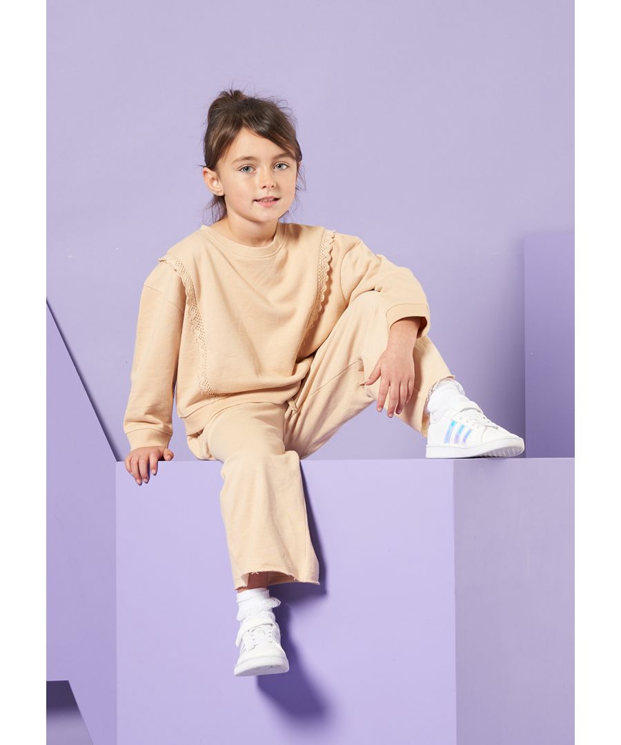 Our gorgeous washed stone sweatshirt with cotton lace trim is the perfect wardrobe staple for you mini trend setters. It’s super soft making it your new fav! Angel & Rocket cares - made with Fairtrade cotton  Colour: Stone  100% Cotton  Look after me: Think planet  wash at 30c