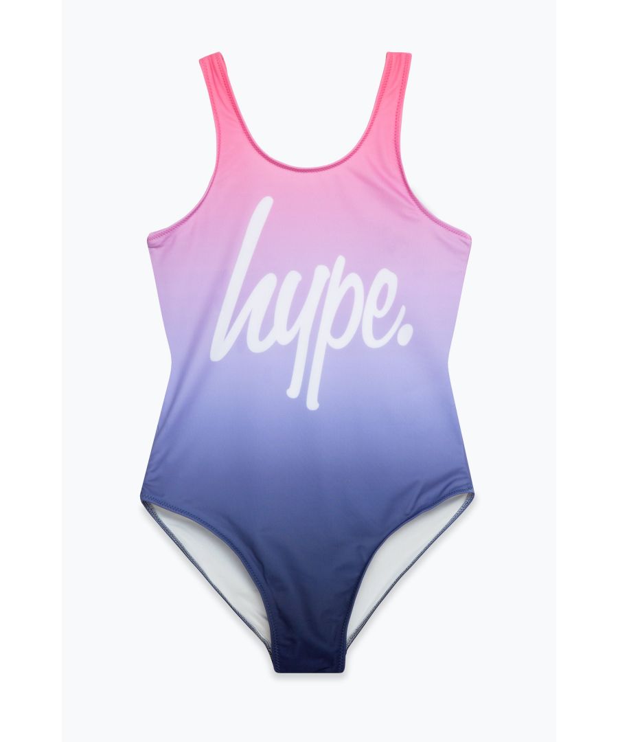 Swim is in. Meet the HYPE. Girls Lilac Fade Swimsuit, the ultimate girls swimsuit you'll want to wear everyday of summer, autumn, winter and spring. Designed in our standard kids swimsuit shape, boasting an all over fade print in a pink, lilac, and navy colour palette and the iconic HYPE. script logo in contrasting white. Wear with HYPE. sliders, swimming goggles and a beach towel in hand. Machine wash at 30 degrees.