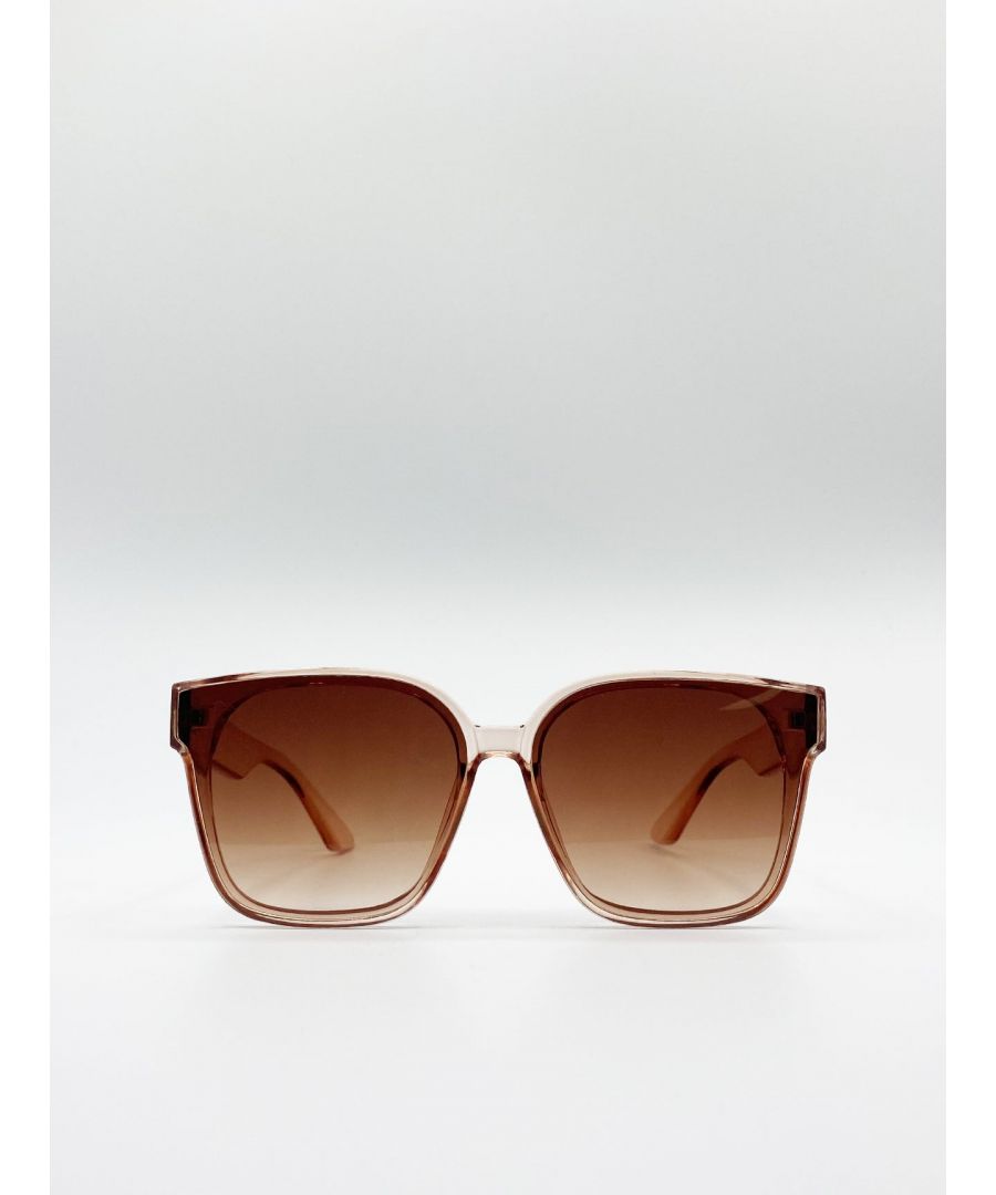 Oversized Cateye Sunglasses In Crystal Sand\nFrame Colour: Crystal Sand\nLens Colour: Brown Grad\nFrame Material: Plastic\nOne Size\nFDA Approved\nUV 400 PROTECTION IN ACCORDANCE WITH 89/686/EEC BS EN ISO 123-1:2013\nSKU: SG80207190