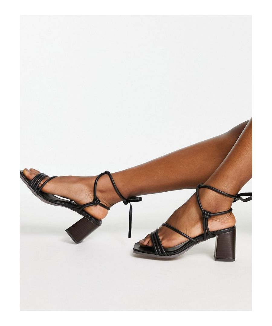 Sandals by ASOS DESIGN Dress from the feet up Strappy design Tie-leg style Open toe Mid block heel Wide fit Sold by Asos