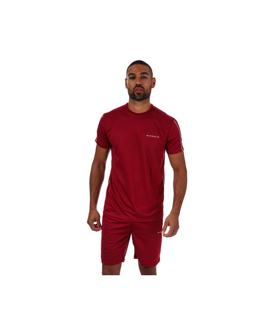Mens McKenzie Axton Poly T- Shirt- Shorts Set in red.- T- Shirt:- Crew neck.- Short sleeve.- Contrasting piping to the sleeves.- Standard-fit.- Main material: Polyester: 100% Polyester.  Machine washable. - Shorts:- Elasticated waistband. - Signature McKenzie branding.- Two side pockets.- Main material: Polyester: 100% Polyester.  Machine washable. - Ref: MCKTM14480R