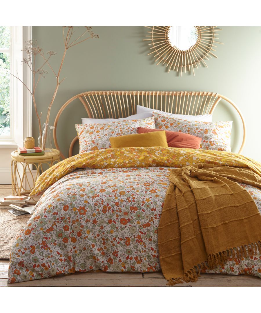 Add a burst of botanic to your room with this ditsy floral duvet cover and pillow case set, featuring an array of vibrant flowers. The floral print covers the reverse on an ochre base so you can switch the look when you need to.