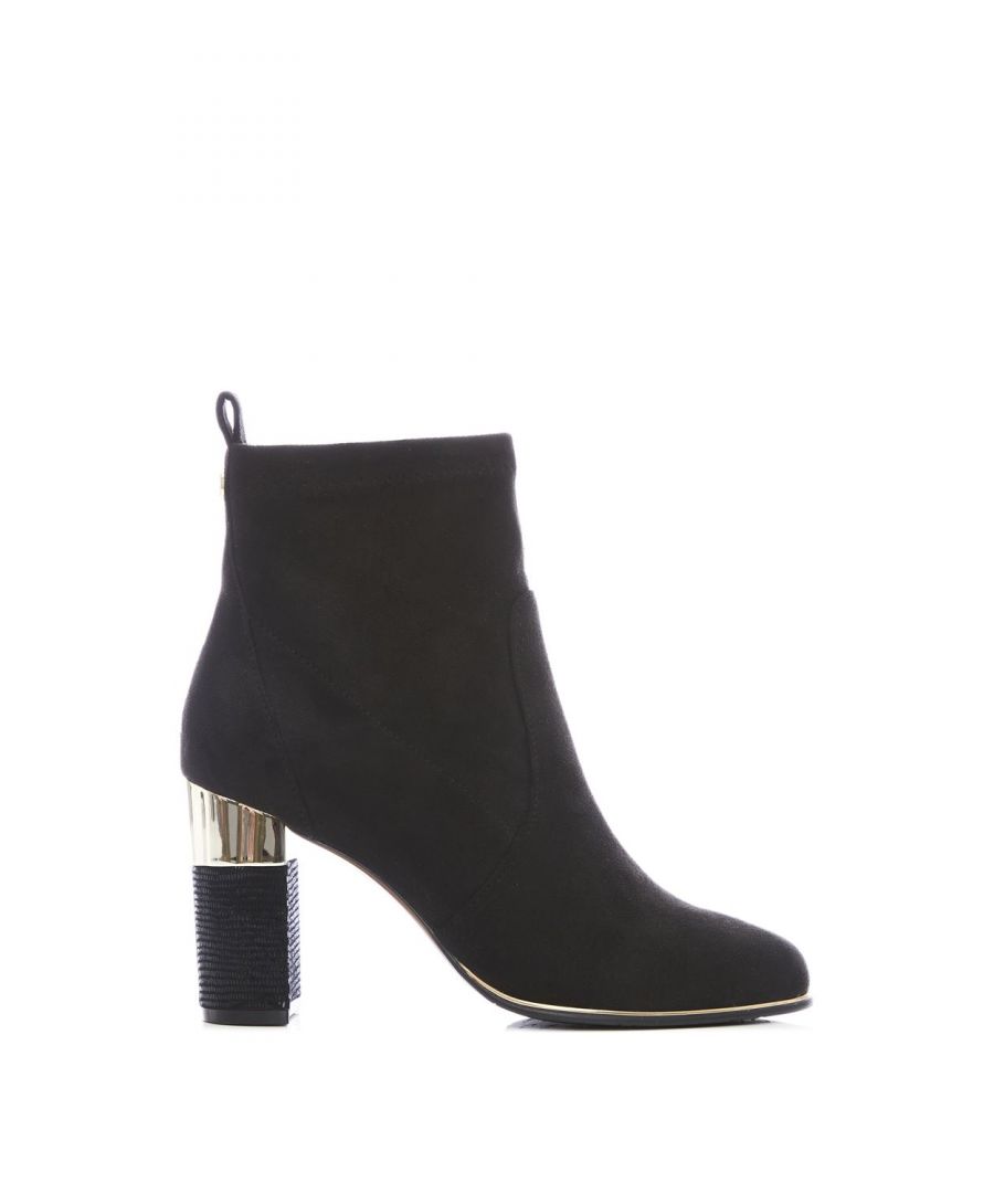 Stay stylish this autumn-winter with Lorita, our gorgeous dressy sock boot. We love the statement scalloped heel detail, which adds to the premium feel of this boot. The stretch upper allows the material to sit smoothly against the leg. Complete with inside zip for easy access. 