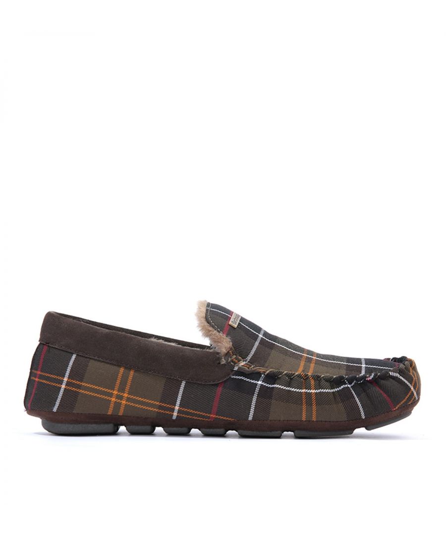 Relax in style with the Monty Slippers from Barbour. Crafted from durable cotton twill with their signature classic tartan design. Featuring a cosy faux fur lining providing comfort and warmth. Finished with the signature Barbour branding. Cotton Twill Uppers, Faux Fur Lining, Rubber Sole, Barbour Branding.
