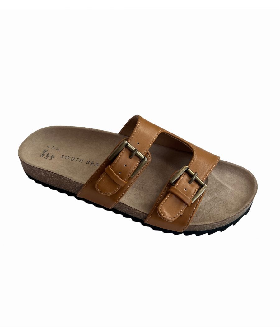 South Beach. Shopping for sunny days? Look to these tan buckle sliders.\n\n\n- Leather-look finish\n- Buckle straps\n- Open toe\n- Slip-on design\n- Flat sole