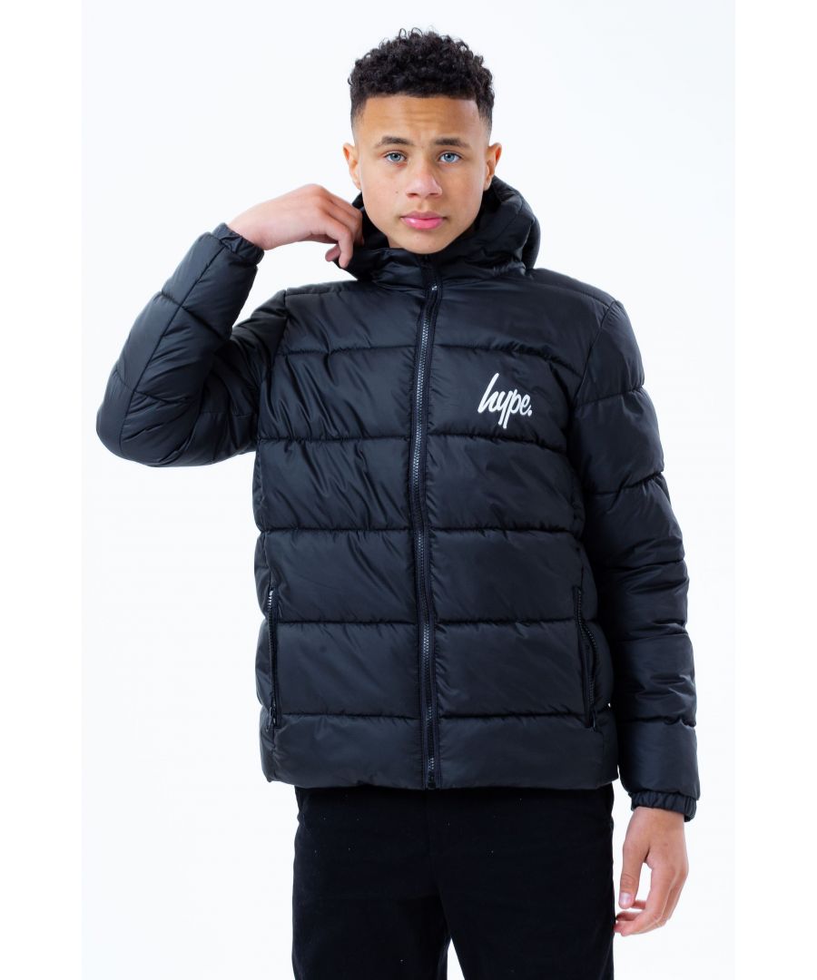 Junior Boys Hype Hooded Puffer Jacket in black.- Detachable hood.- Zip fastening.- Two zip pockets.- Iconic Hype. prints to must-have brand logo essentials.- Elastic cuffs.- Shell: 100% Polyester. Lining: 100% Polyester. Padding: 100% Polyester.  Machine washable. - Ref: BTS21471J