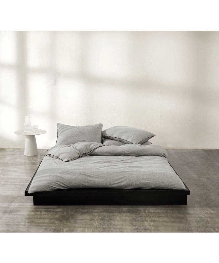 Adorn your sleep space in a timeless style with the Logo Essentials Duvet Cover from Calvin Klein. This supremely soft and luxurious Modern Cotton bedding in Dusk colour is finished with a Midnight colour logo piping around all four sides on the duvet cover and the pillowcase, which brings a cosy and sophisticated aesthetic to your bedroom. Available in stone and dusk colours.