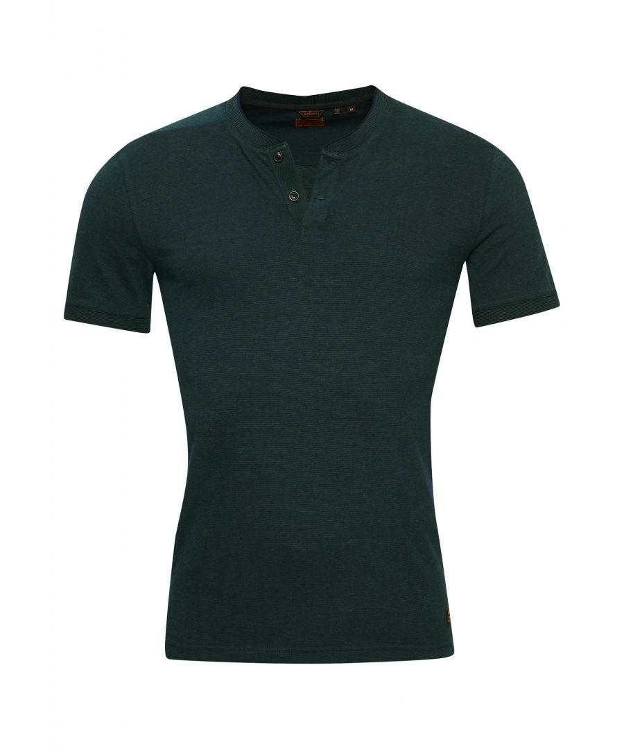 Look and feel great in the Short Sleeve Henley top made from Premium Organic Cotton, providing that super soft-to-touch comfort. Being sustainably friendly never looked so good. Slim fit – designed to fit closer to the body for a more tailored lookClassic Henley necklineButton fasteningShort sleevesSignature logo patchMade with Organic CottonMade with Organic Cotton - Made using cotton grown using organic farming methods which minimise water usage and eliminate pesticides, maximising soil health and farmer livelihoods.