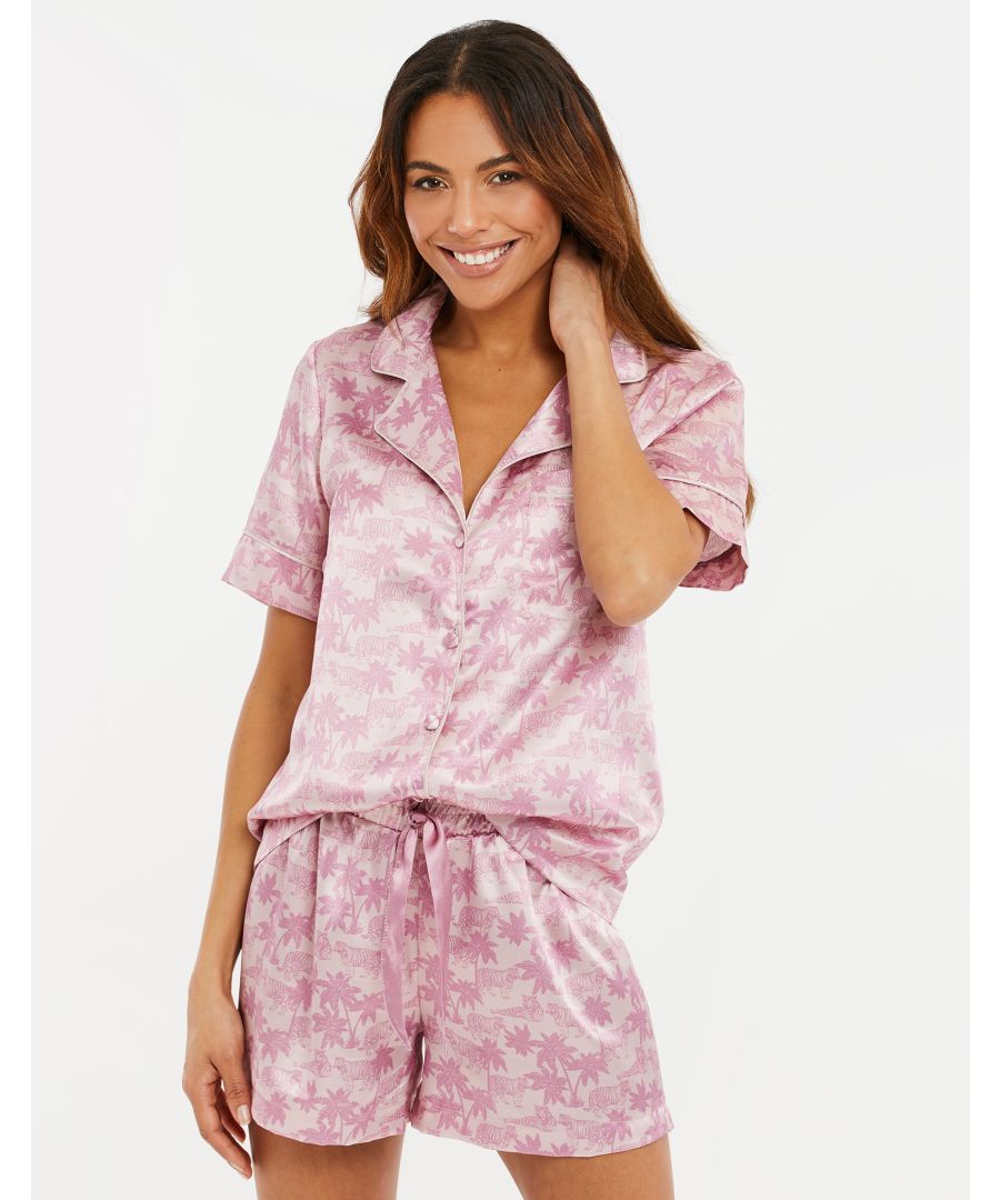 Bring some luxury to your nightwear with this satin pyjama set from Threadbare. It features short sleeve button fastening top with revere collar and piping detail and shorts with elasticated waistband, drawcord and pack-away bag.