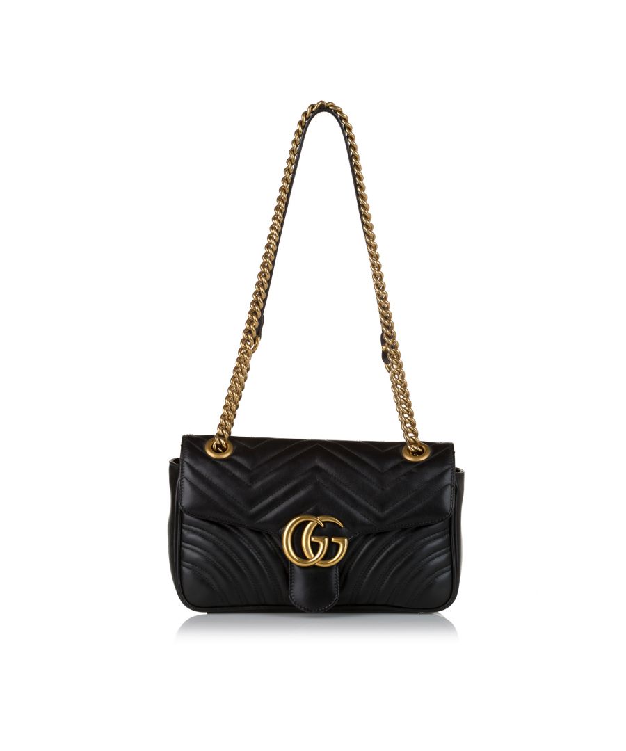 VINTAGE. RRP AS NEW. The GG Marmont crossbody bag features a quilted leather body, a curb chain strap, a front flap with a magnetic closure, and an interior zip pocket.Exterior Side Scratched. Interior Lining stained with Water Mark, Other. Exterior Side Scratched. Interior Lining stained with Water Mark, Other. \n\nDimensions:\nLength 15cm\nWidth 25cm\nDepth 7cm\nShoulder Drop 55cm\n\nOriginal Accessories: Dust Bag, Box\n\nSerial Number: 443497 585795\nColor: Black\nMaterial: Leather x Calf\nCountry of Origin: Italy\nBoutique Reference: SSU177496K1342\n\n\nProduct Rating: GoodCondition\n\nCertificate of Authenticity is available upon request with no extra fee required. Please contact our customer service team.
