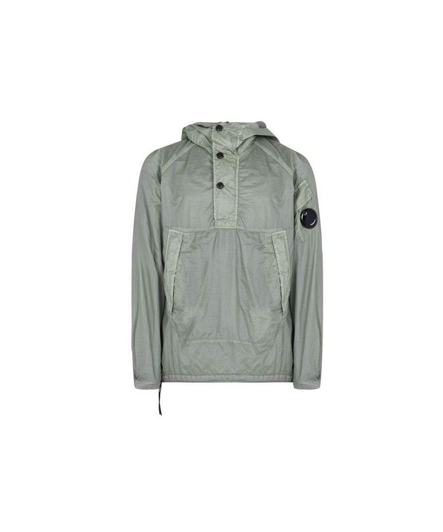 This C.P Company Jacket is crafted from nylon in a green colour-way. This jacket consists of iconic detailing to the sleeve pocket arm, 3/4 button placket, adjustable stud fastened wrists for a snugger fitting, two front pockets, drawstring hood and C.P company signature logo.