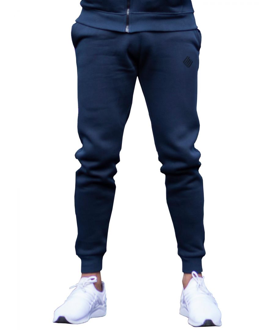 Crafted from Soft and Light Polyester, these Enzo Designer Joggers feature Elasticated Waist with drawstring and an Enzo Logo Embroidery on Leg. Matching Tracksuit Hoodie Available. Ideal for Autumn, Winter, Spring Seasons wear Casually, Sports or Off leisure