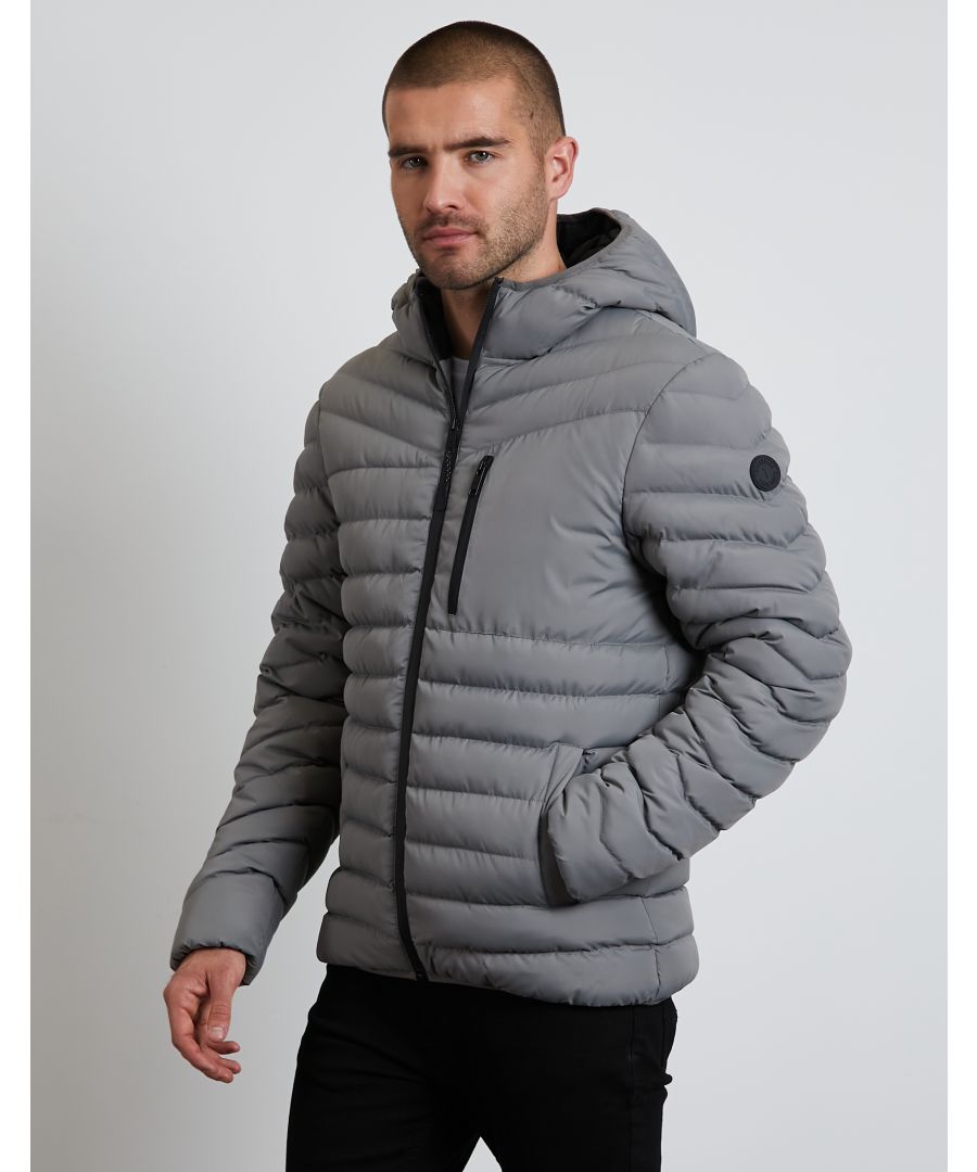 This update of the bestselling, lightweight, padded jacket by Threadbare is the perfect jacket all year round. It features Threadbare branding on the arm, two snap fastening front pockets, a zip fastening chest pocket and an internal phone size pocket. This versatile style has a hood and is zip fastened with reflective detail. Other colours available.
