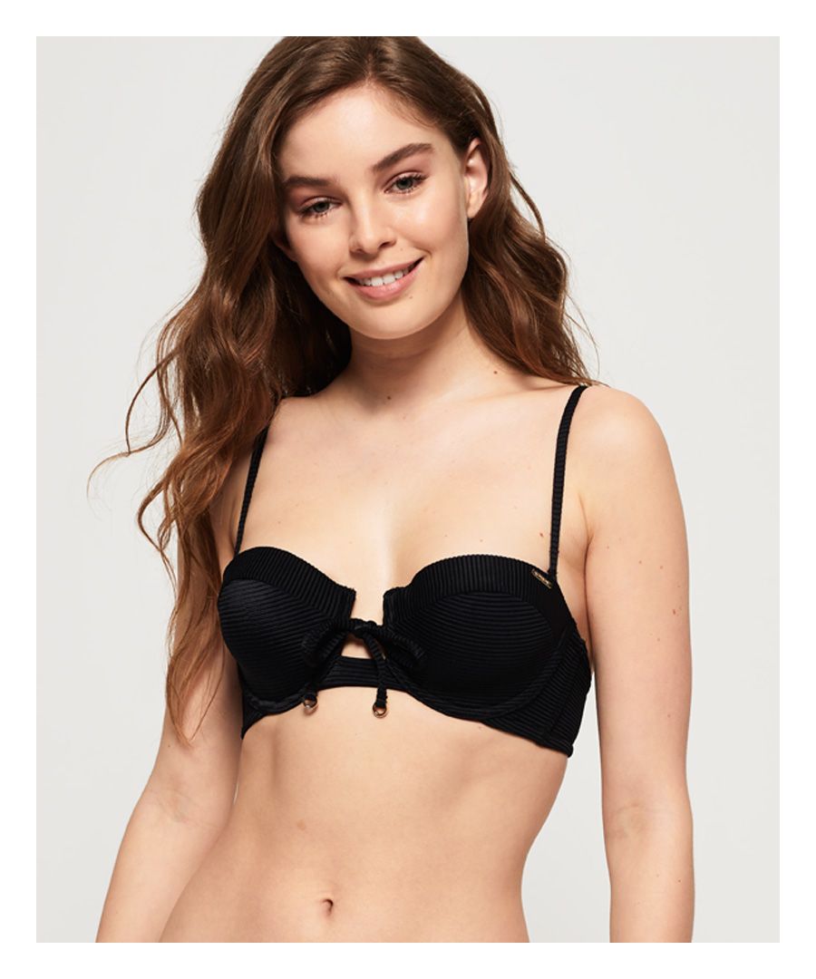 Superdry women's Alice textured cupped bikini top. Take the plunge this season in the Alice bikini top, with detachable, adjustable straps, a rear clasp fastening and knot detailing on the front. This bikini top is completed with a logo badge on the cup.Matching bottoms available.