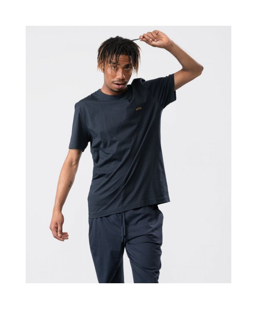 A signature T-shirt by BOSS Menswear, cut to a regular fit with a crew neckline. Featuring a contrasting logo in a curved design at the left chest, this short-sleeved T-shirt is created in single-jersey cotton with a soft feel.\nRegular fitCrew neckShort sleevesStandard length\n100% Cotton\n50469045\nModel is 5'11