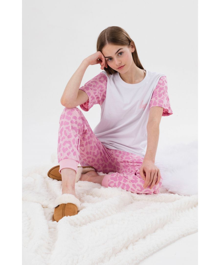 Introducing the HYPE. Girls Pink Leopard Script PJ’s, the nightwear you’ll want to wear all day long. The tee is designed in a 100% cotton white fabric base with short sleeves in a pink leopard print and the HYPE. script logo. The bottoms are made from a 95% poly 5% elastane blend for the ultimate comfortable feel, with an all-over pink leopard sublimated print. Wear with a pair of HYPE. slippers or a matching hoodie for double the comfort.