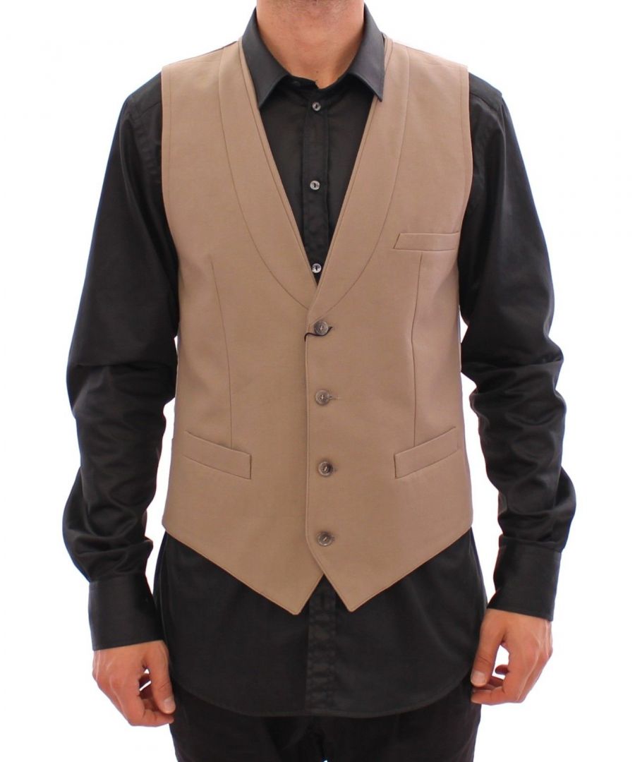 Dolce & ; Gabbana Vest Absolutely stunning, 100% Authentic, brand new with tags Dolce & ; Gabbana Beige Dress Vest Fitting : Slim, adjustable back strap Color : Beige Full front button closure Three front pockets Logo details, logo engraved buttons Made in Italy