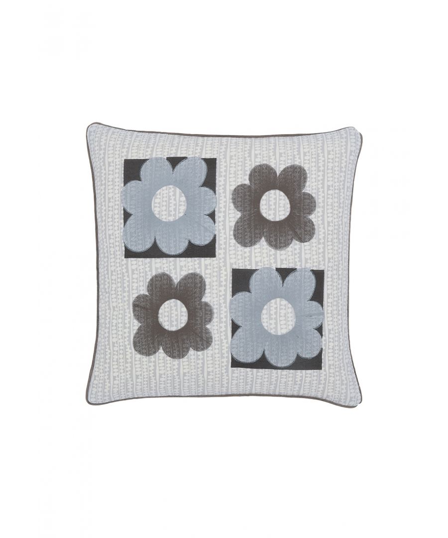 The cosiness with the small breakfast cushion displaying a graphic floral design with embroidered detailing to give a striking finishing touch.
