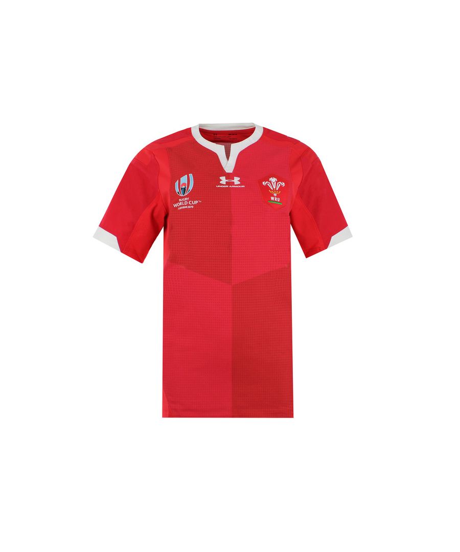 Light, soft and sweat wicking the Under Armour Wales RWC 2019 Home Test Shirt will keep you comfortable whether you wear it in the gym, on the pitch or in the stands. It has a comfort fit which is perfect for everyday wear.\n\nThe shirt uses the same precision and quality build that the platers enjoy on pitch for enhanced performance and style.\n\nThe design features the RWC logo and the Under Armour logo while the three feathers are placed on a shield to bring to mind the 