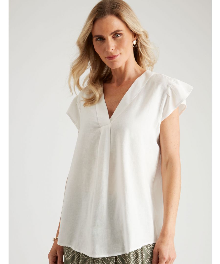 This flattering blouse is sure to add a touch of femininity to any outfit. Made from a soft and light fabric, this blouse is perfect for the summer season. The silver and white print is simple but stylish, and goes great with any color palette. The v-neck neckline is comfortable and stylish, and will keep you cool in the heat. The oversized fit gives you plenty of room to move and breathe, while the short sleeves are perfect for warmer weather. Take the heat off this summer with this cropped silver top. Cover up your arms with this stylish top that's made to be worn during the summer months. With shortsleeve length at the cap, it's perfect for days where you don't want to take too much time getting ready. The neckline is flattering, making it perfect to wear on warmer days. And as an added bonus, the collar details give it an extra pop of style. -- Like the goddess of the underworld herself, this oversized blouse is fit for those hot summer days you can't wait to get out of. With an unassuming print that's plain as day, this piece screams 'I'm here!' with every step you take. Sitting on top of your curves like an oppressive queen, this heavyweight material is meant to be worn with shorts or jeans (or anything else you please) for maximum comfort. The short sleeves are perfect for those scorching sunsets where you'd rather be laying by the pool than inside. And if there's one thing that we know about Persephone, it's that she's got style! With cap sleeves that hit right at the shoulder for maximum coverage, this blouse is perfect for hot weather. The silver color gives it an elegant look that can dress up or dressdown any look you have going on. The cropped top length helps elongate your figure without being too revealing, making it the perfect choice for those who want discretion along with their protection from the sun. The neckline detail features an adorable collar that ties at the neckline to provide extra security.Material:  55% Linen / 45% Viscose