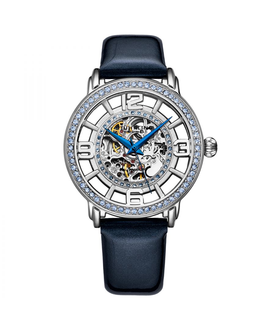 Women's Automatic Silver Case, Silver Crystal Studded Bezel, Silver Skeletonized Dial With Gold Toned And Red Accents, Blue Hands, Silver Markers, Blue Patented Genuine Leather Strap Watch
