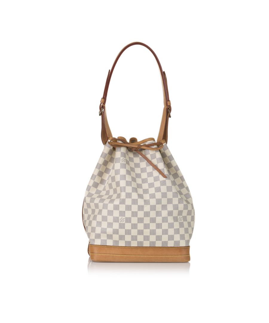 VINTAGE. RRP AS NEW. The Noe features a damier canvas body with leather trim, an adjustable vachetta shoulder strap, and a top drawstring closure.Exterior Botton Scratched. Exterior Botton stained with Transfer Of Color, Other. Exterior Corners Peeling. Embellishment Rusty/Tarnished. Exterior Botton Scratched. Exterior Botton stained with Transfer Of Color, Other. Exterior Corners Peeling. Embellishment Rusty/Tarnished. \n\nDimensions:\nLength 35cm\nWidth 26cm\nDepth 19cm\nShoulder Drop 30cm\n\nOriginal Accessories: This item has no other original accessories.\n\nSerial Number: AR3160\nColor: White x Blue\nMaterial: Canvas x Damier Canvas x Leather\nCountry of Origin: France\nBoutique Reference: SSU156135K1342\n\n\nProduct Rating: GoodCondition\n\nCertificate of Authenticity is available upon request with no extra fee required. Please contact our customer service team.