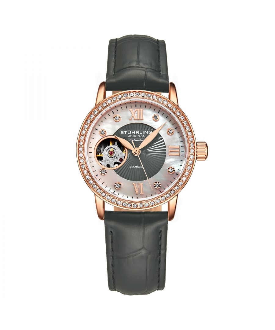 Ladies Automatic Rose/Gold Toned Case, Rose/Gold Toned Crystal Studded Bezel, White MOP Dial With Grey Center, Rose/Gold Toned Hands, Rose/Gold Toned Crystal Markers, Grey Alligator Embossed Genuine Leather Strap Watch
