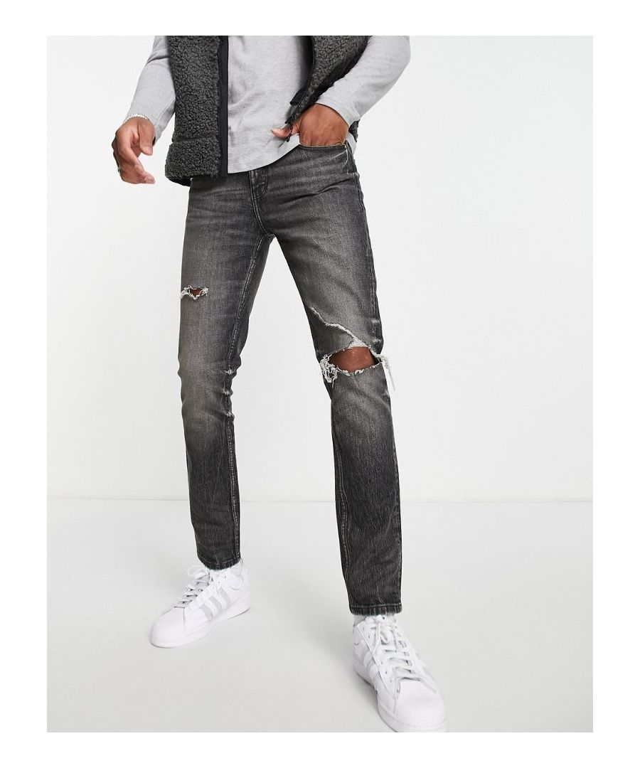 Skinny jeans by ASOS DESIGN Wear, wash, repeat Distressed finish Belt loops Five pockets Skinny fit Sold By: Asos