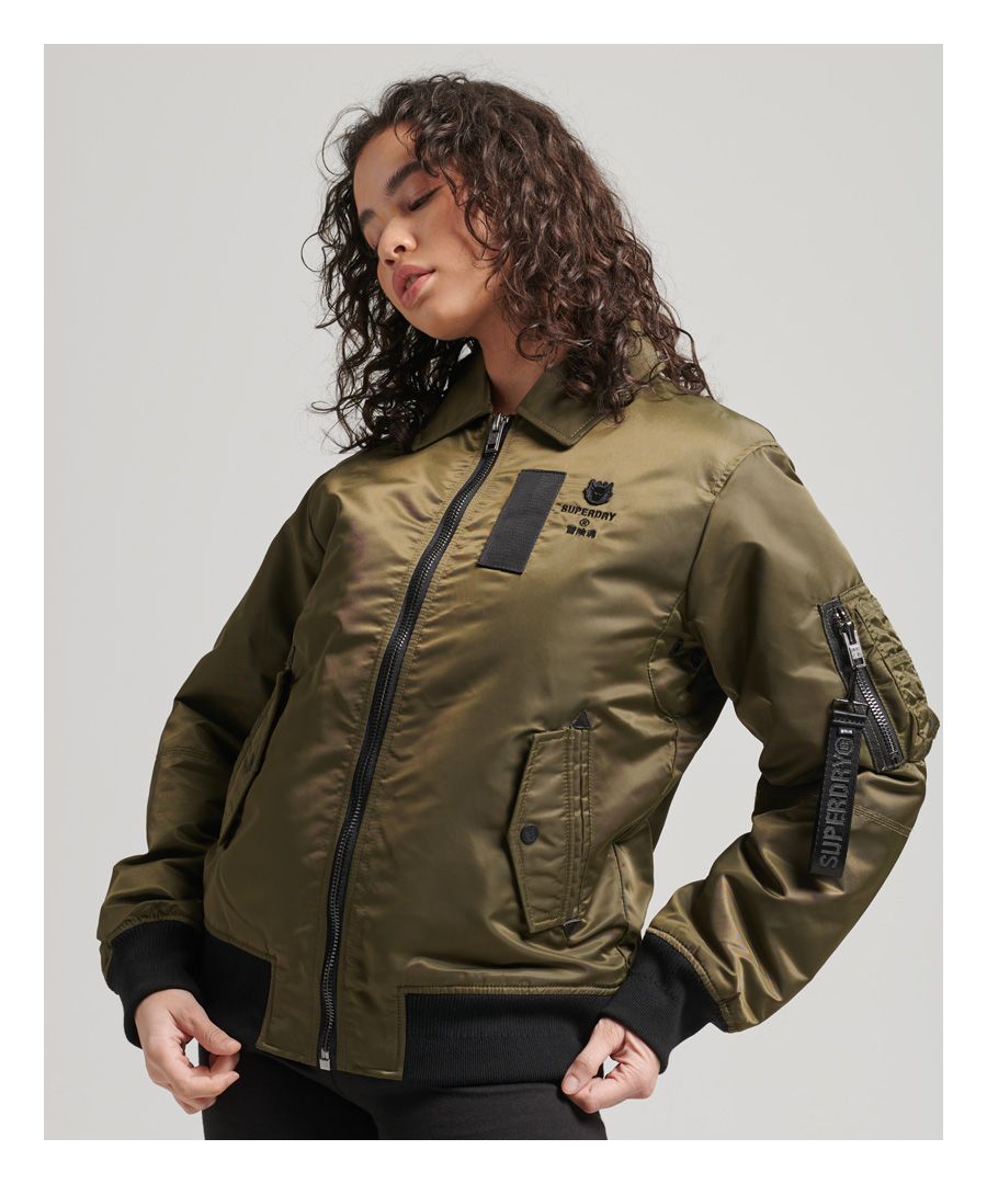 Inspired by classic military wear; this Energy MA2 bomber jacket is sure to become your new favourite jacket. Featuring a main zip fastening, a lightly padded lining and three pocket design.Main zip fasteningPadded liningThree pocket designVentilation detailingRibbed cuffs and hemEmbroidered logo detailingThe padding in this jacket is 100% Recycled Polyester – each jacket contains up to 10 recycled bottles, this avoids these bottles being sent to landfill or polluting our oceans.