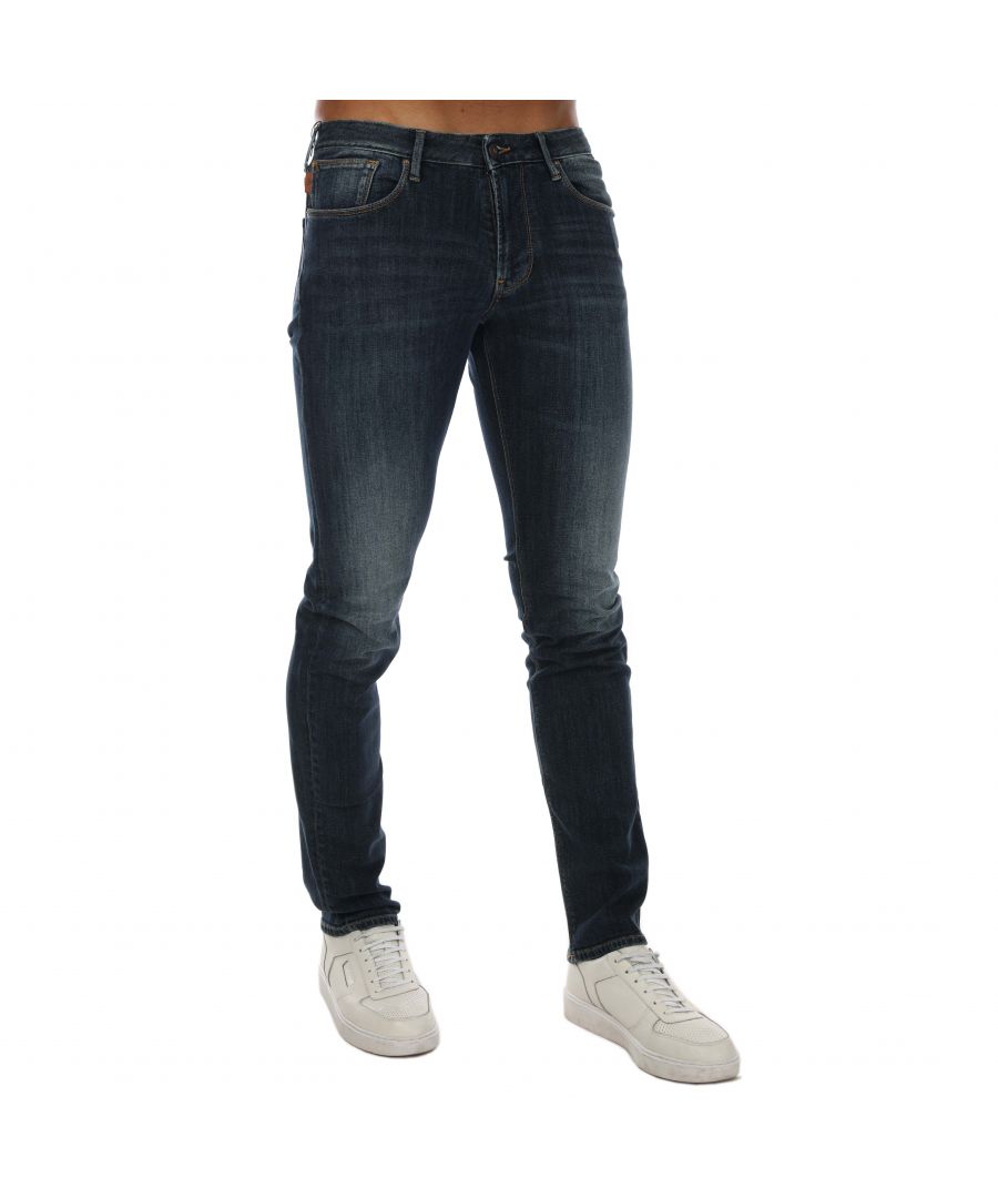 Mens Armani J06 Slim Fit Jeans in denim.- 5-pocket construction. - Zip fly and button fastening.- Seven belt loops on low waist band.- Metal eagle at rear waist.- Logo leather tab at coin pocket.- Branded patch to reverse.- Slim fit.- 99% Cotton  1% Elastane.- Ref: 6G1J06D19Z0942
