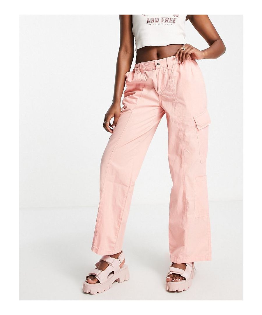 Trousers by ASOS DESIGN Thanks, it's ASOS Low rise Elasticated waist Functional pockets Straight fit Cut with more room around the hips Sold by Asos