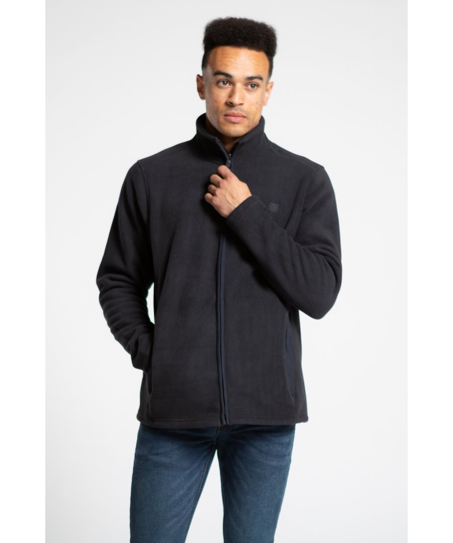 This zip-through, polar fleece from Kensington Eastside is a cosy addition to your wardrobe. Features inside borg lining, funnel neck with ribbed interior, two zipped side pockets and Kensington Eastside logo. Other colours and similar styles available.