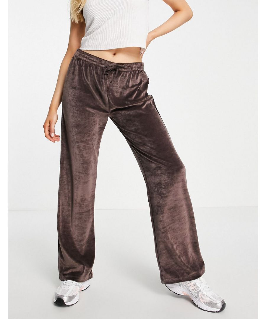 Joggers by Topshop Can't go wrong in sweats Low rise Elasticated drawstring waist Back pocket Straight fit Sold by Asos