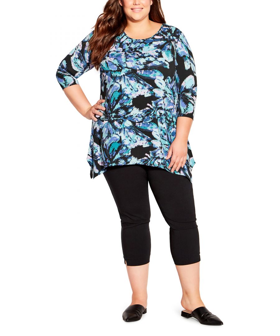 Treat your curves to the Cosmic Print Tunic! With its round neckline, 3/4 length sleeves, and a sharkbite hemline, this style keeps you comfortable from day to night and season to season. Key Features Include: - Round neckline - 3/4 length sleeves - Relaxed silhouette - Pull over style - Sharkbite hemline