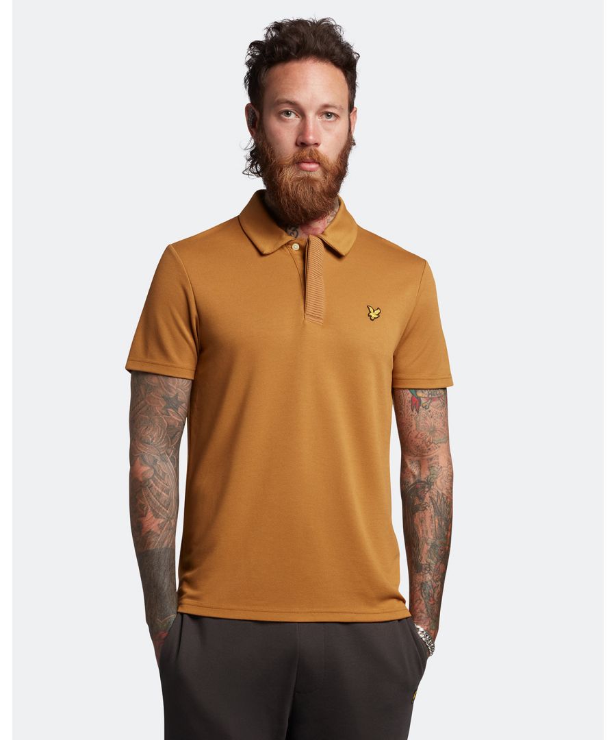 The Lyle & Scott men's Textured Polo Shirt offers undeniable quality and style, and maximum comfort. The lightweight composition makes for a versatile fit, while the Golden Eagle and textured accents add subtle style to any outfit. \n \nFit: Regular\nIt is crafted to fit the body neither too tightly or too loosely, leaving you with a classic, timelessly stylish look. We recommend you order your usual size, but if you're caught between two, go a size up.