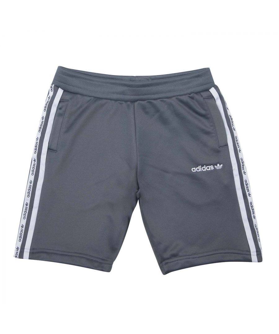 Junior Boys adidas Originals Microtape Shorts in grey.- Elasticated waist with drawcord.- Two open front pockets.- adidas' iconic 3-Stripes to the sides.- Signature branding to the thigh.- Standard-fit.- Main Material: 100% Polyester (Recycled).- Ref: HB0542J