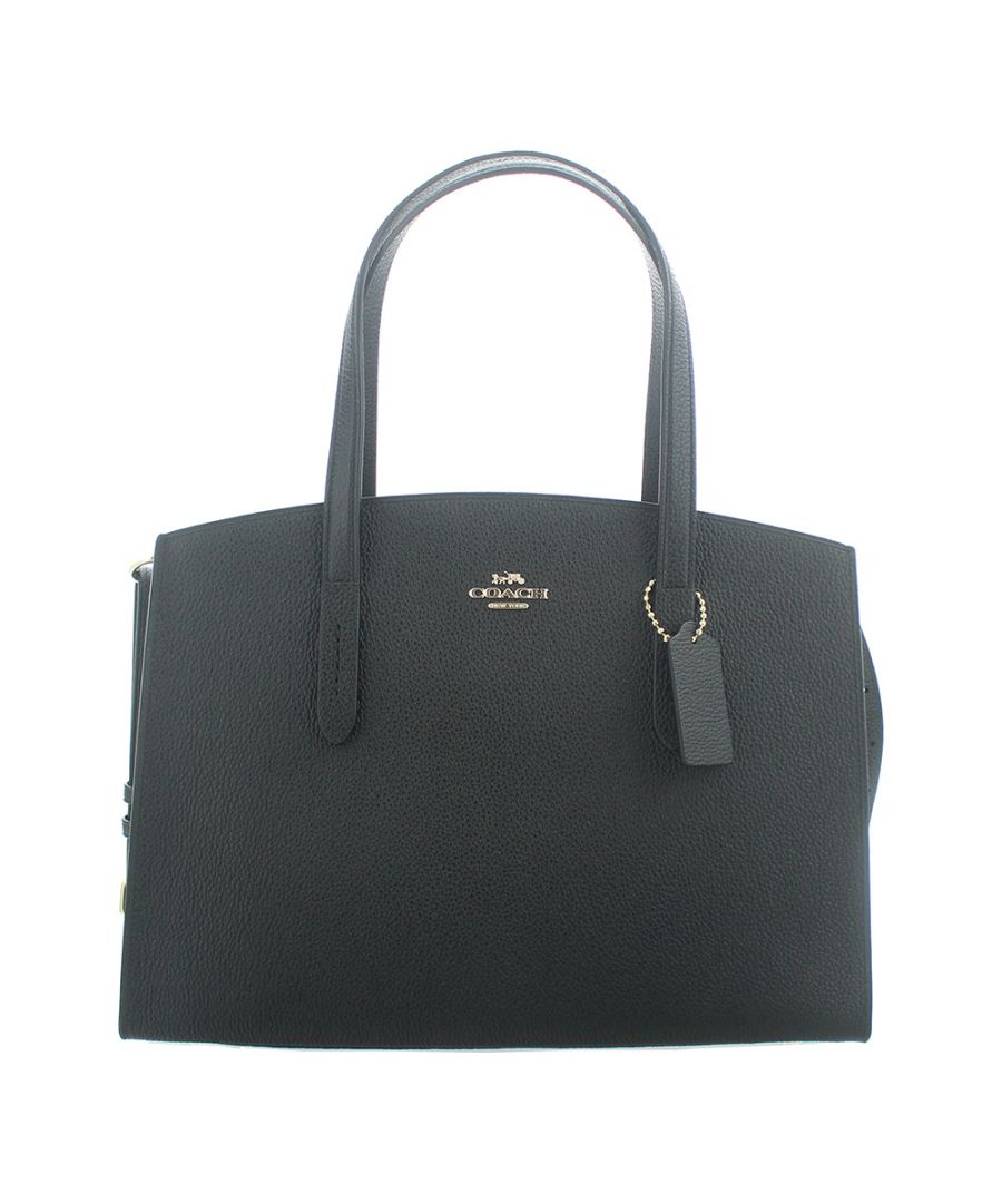 Coach Charlie Black Pebble Leather Carryall is crafted of luxurious polished pebble leather. The main compartment has three sections the centre one is zipped, plus two slip pockets. This lightweight carryall has 2 carry handles and an adjustable shoulder strap. Beautifully finished with the Coach logo and tag
