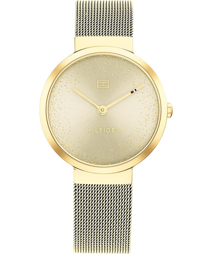 This Tommy Hilfiger Libby Analogue Watch for Women is the perfect timepiece to wear or to gift. It's Gold 32 mm Round case combined with the comfortable Gold Stainless steel watch band will ensure you enjoy this stunning timepiece without any compromise. Operated by a high quality Quartz movement and water resistant to 3 bars, your watch will keep ticking. Classic and charming  watch perfect for every women who likes to be the centre of attention High quality 19 cm length and 15 mm width Gold Stainless steel strap with a Fold over clasp Case diameter: 32 mm,case thickness: 6 mm, case colour: Gold and dial colour: Gold