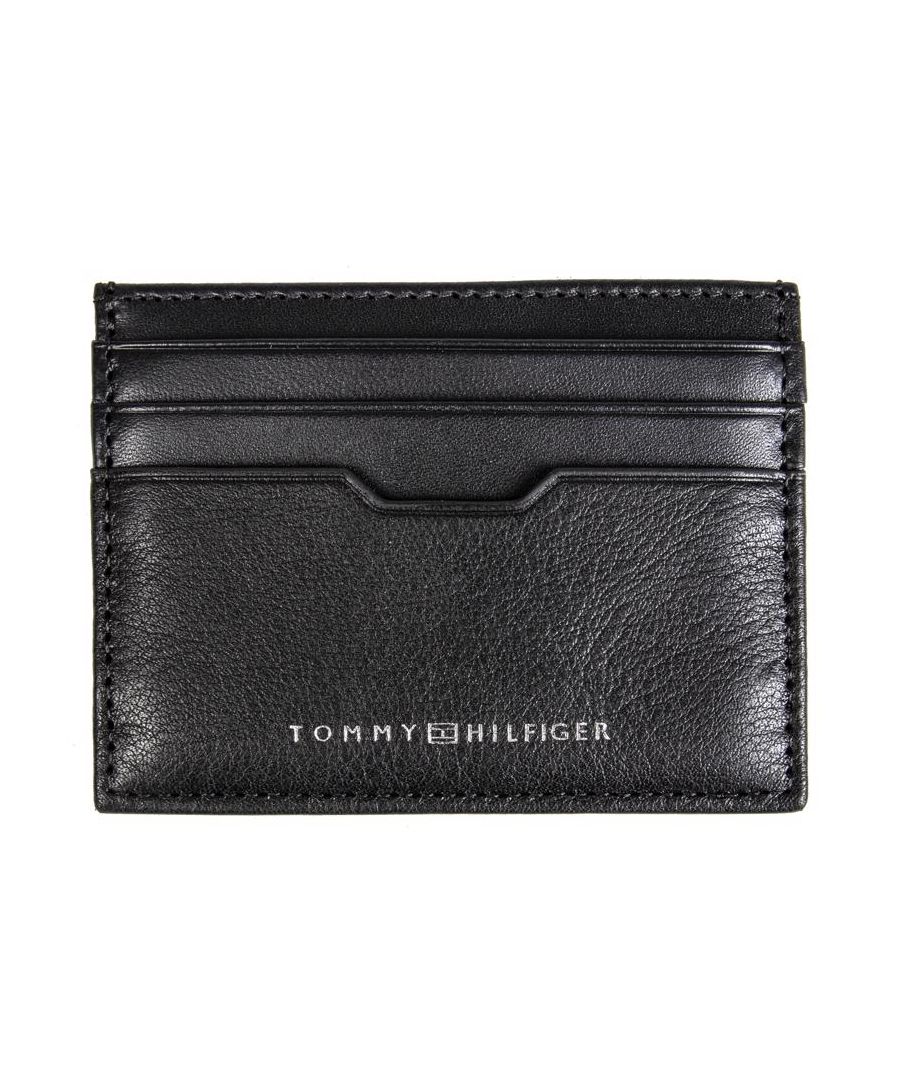 Mens black Tommy Hilfiger downtown wallet, manufactured with leather. Featuring: front branding, 6 card slots, single note section, corporate stripe and presentation box.
