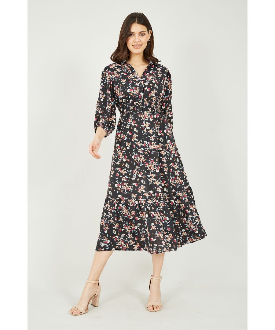 Step out in style in this Yumi Black Floral Print Shirt Dress, the perfect piece to see you through the seasons. Features stunning, statement 3/4 balloon sleeves, a subtle fitted waist and a classic shirt style collar. Match with ankle boots or platform trainers and layer with leather or denim.