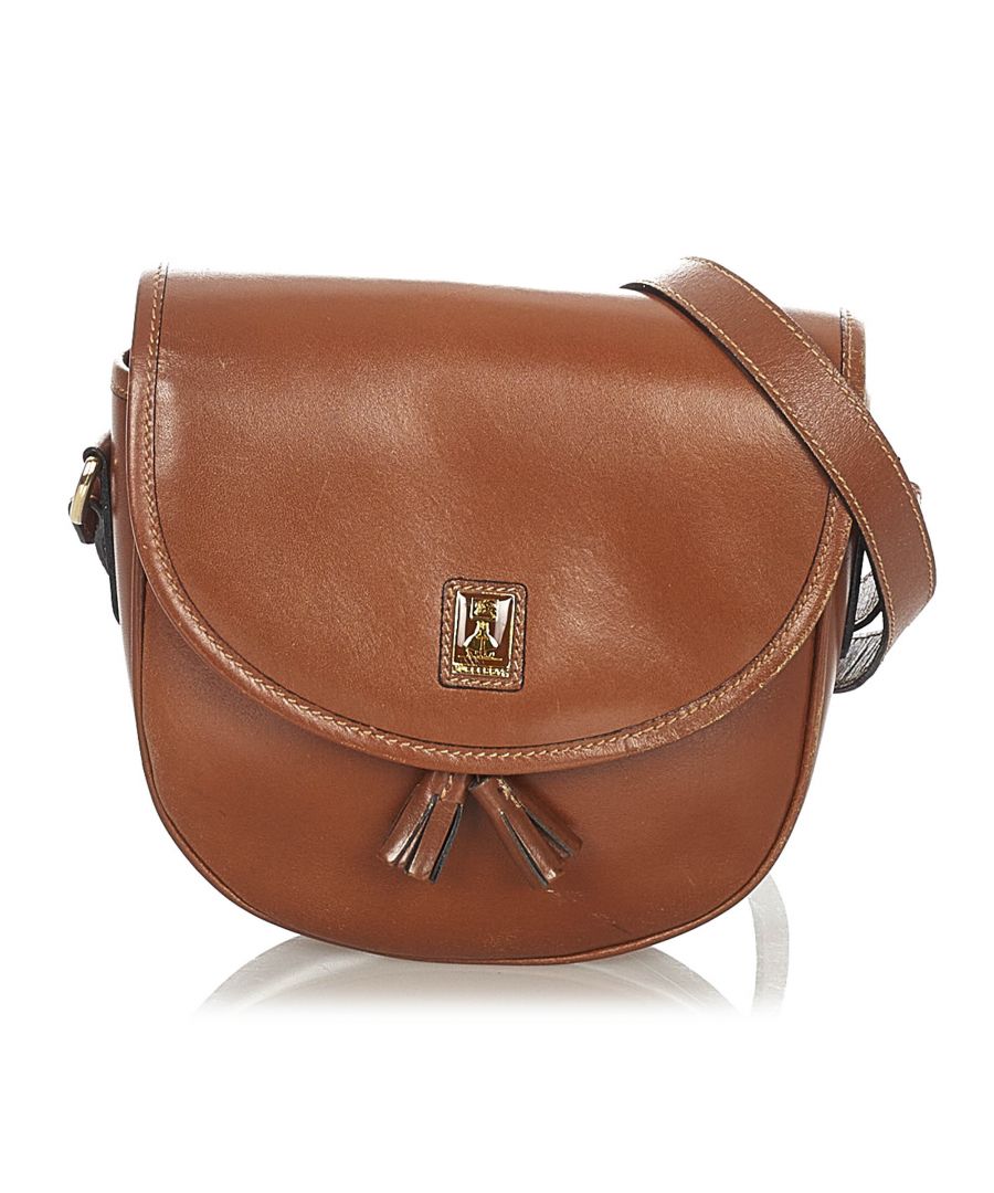 VINTAGE. RRP AS NEW. This crossbody bag features a leather body, a flat leather strap, a top flap with magnetic snap button closure and tassel detail, and an interior zip pocket.Exterior back is discolored, scratched and stained with transfer of color. Exterior bottom is discolored and scratched. Exterior front is discolored, scratched and stained with transfer of color. Exterior handle is discolored and stained with transfer of color. Exterior side is discolored and scratched. Buckle is scratched and tarnished. Lock is scratched and tarnished. Interior lining is scratched.\n\nDimensions:\nLength 18cm\nWidth 7cm\nDepth 4.5cm\nShoulder Drop 51cm\n\nOriginal Accessories: This item has no other original accessories.\n\nColor: Brown\nMaterial: Leather x Calf\nCountry of Origin: United Kingdom\nBoutique Reference: SSU175301K1342\n\n\nProduct Rating: GoodCondition\n\nCertificate of Authenticity is available upon request with no extra fee required. Please contact our customer service team.