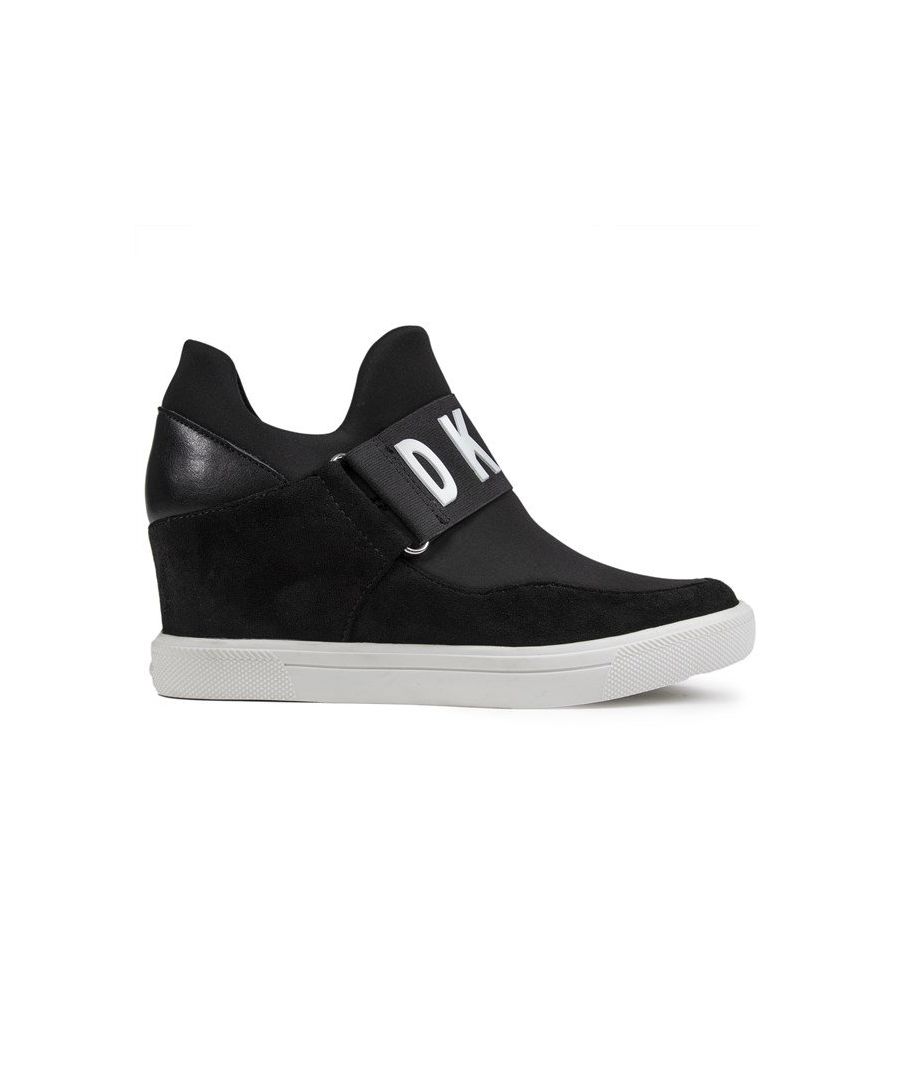 Women's Black Dkny Cosmos Pull-on Sock Style Wedge Boots With Stretch Textile Upper, Featuring Elasticated Strap With White Logo, And Suede And Leather Effect Panels. These Statement Ladies' Heeled Sneakers Have A Fabric Lining, Embossed Heel Cage Detail And Branded White Rubber Sole.