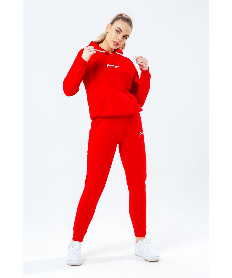 The hype red with white signature script women's hoodie & jogger set is your new go-to loungewear set when you need that extra comfort boost. Designed in 80% cotton 20% polyester for the ultimate soft touch feeling! The hoodie features a fixed hood, kangaroo pocket, fitted hem and cuffs, finished with contrasting white pullers and embossed justhype embroidery across the front. The joggers highlight an elasticated waistband, fitted cuffs and double pockets with contrasting white pullers and embossed justhype embroidery on the side of the leg. Wear together or stand alone with a pair of box fresh kicks. Machine washable.�