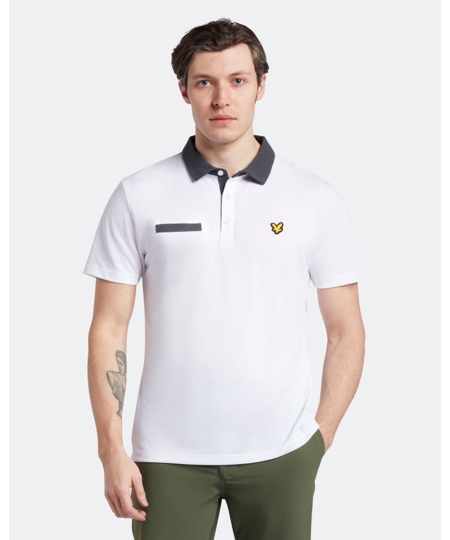 The Lyle & Scott Aviemore Polo Shirt is an understated silhouette, which features a blend of materials that promote flexibility and comfort while playing golf. The look of this men's polo shirt is emphasised by a chest pocket and under collar buttons. \n \nFit: Regular\nIt is crafted to fit the body neither too tightly or too loosely, leaving you with a classic, timelessly stylish look. We recommend you order your usual size, but if you're caught between two, go a size up.